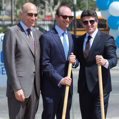 Groundbreaking Ceremony Standing with Shovels Groundbreaking Ceremony Standing with Shovels
