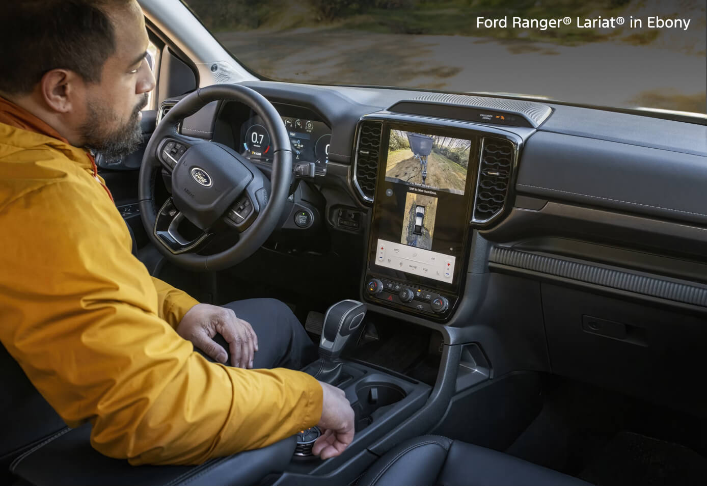 Man sitting in the Ford Ranger Lariat in Ebony
