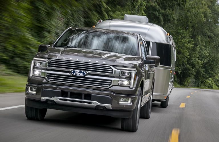 Gray 2025 Ford F 150 Towing Airstream