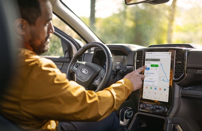 Man Using 2025 Ford Ranger Touchscreen
