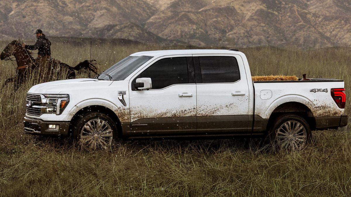 White 2026 Ford F-150 in a Field with Horses and Cowboys