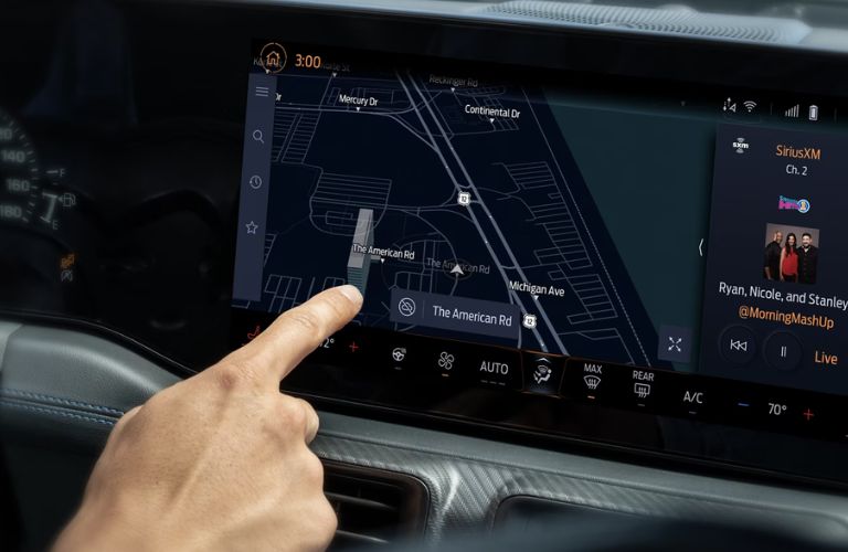 Person Using 2026 Ford Mustang Navigation