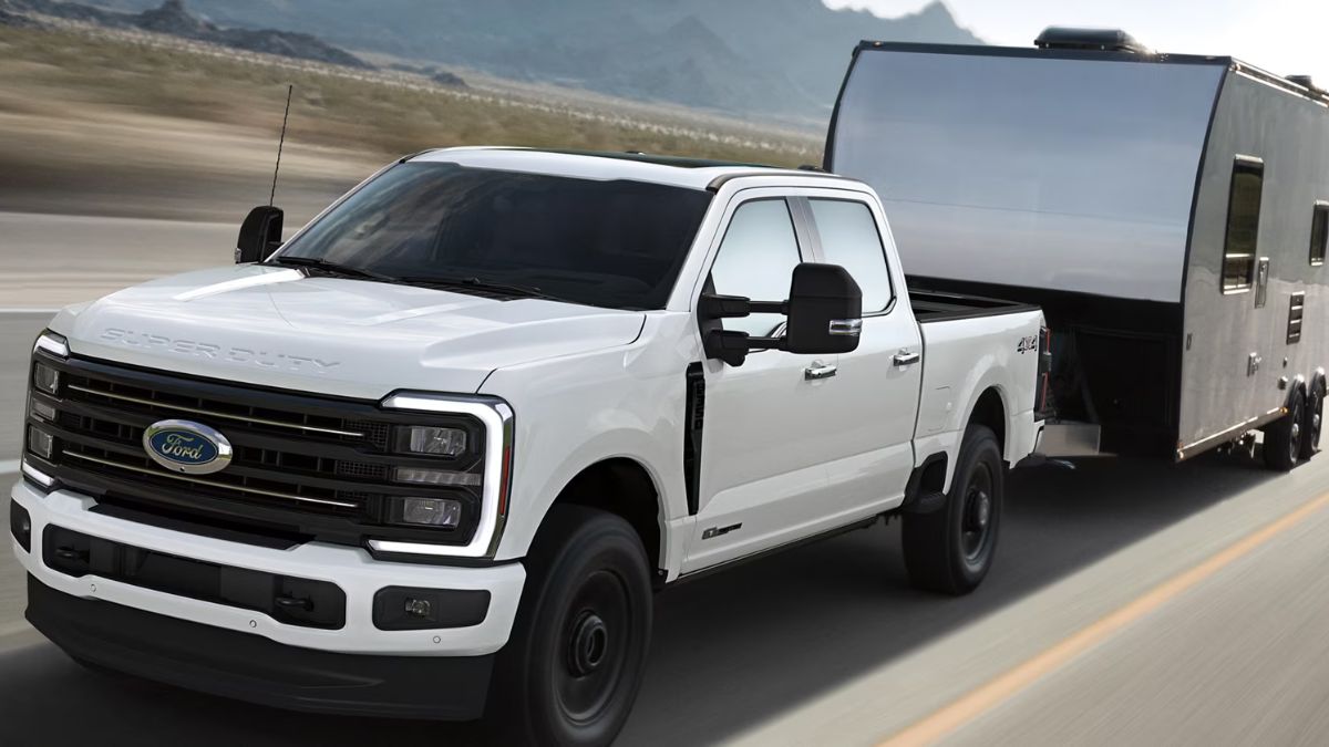 White 2026 Ford Super Duty Towing a Trailer