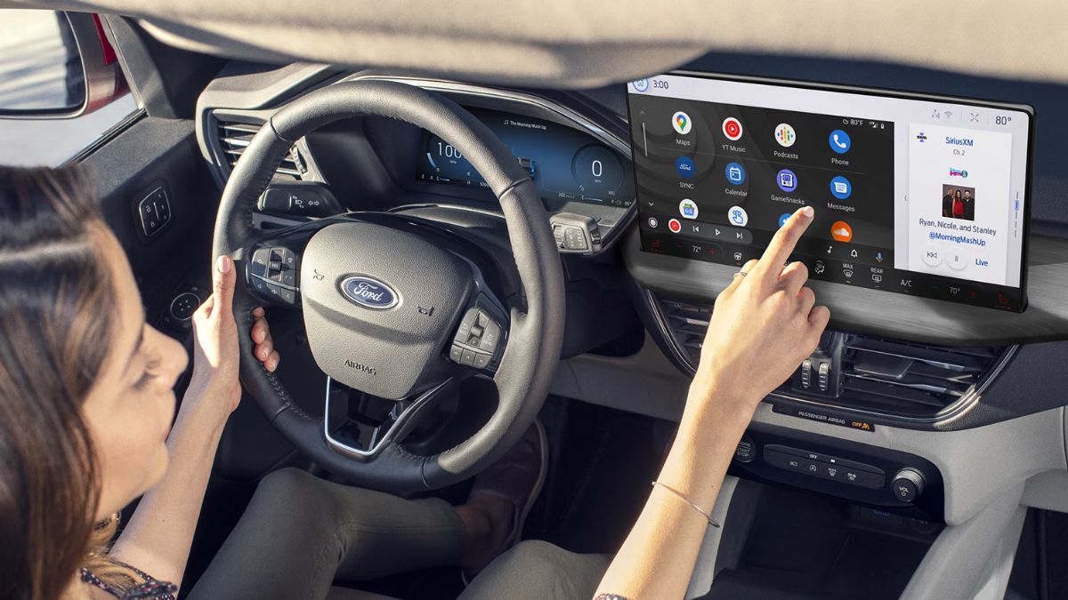 Woman Using Touchscreen in 2025 Ford Escape