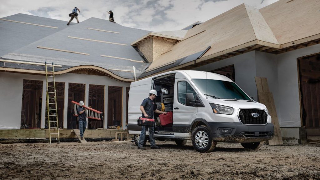 White 2026 Ford Transit and Construction Workers at New House