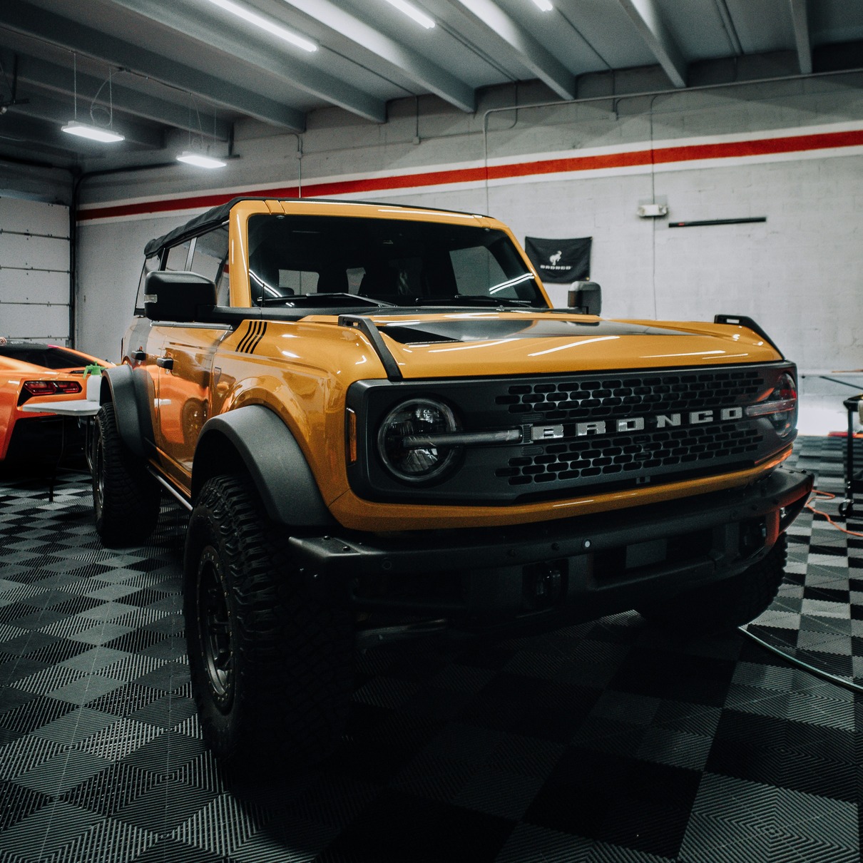 yellow truck parked in a garage