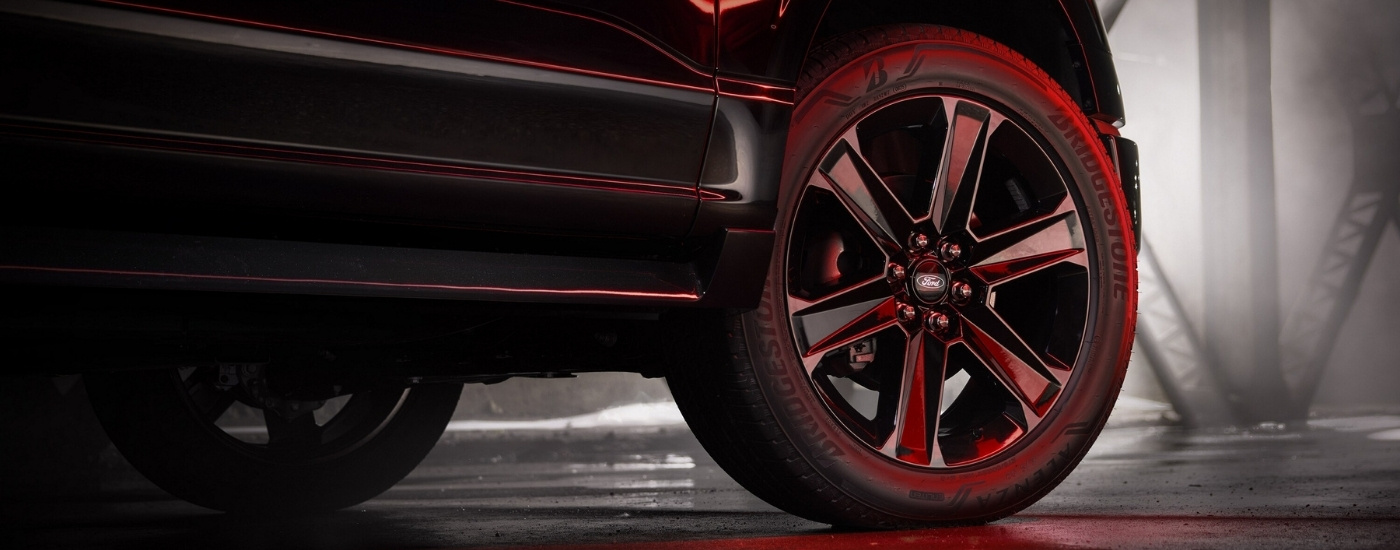 Black wheel on a black 2025 Ford F-150 Lobo.