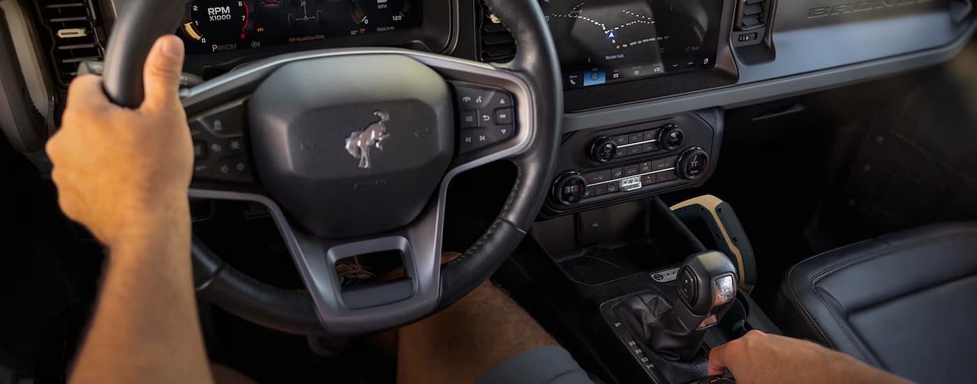 Person driving in a 2026 Ford Bronco