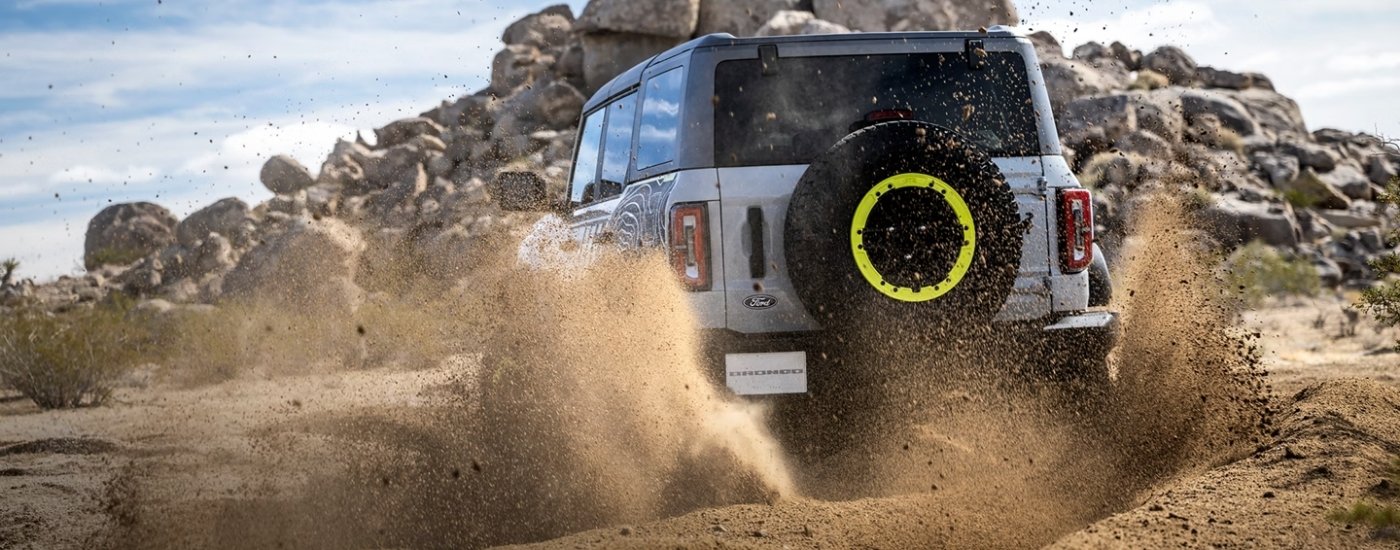 Grey 2027 Ford Bronco RTR kicking up dirt