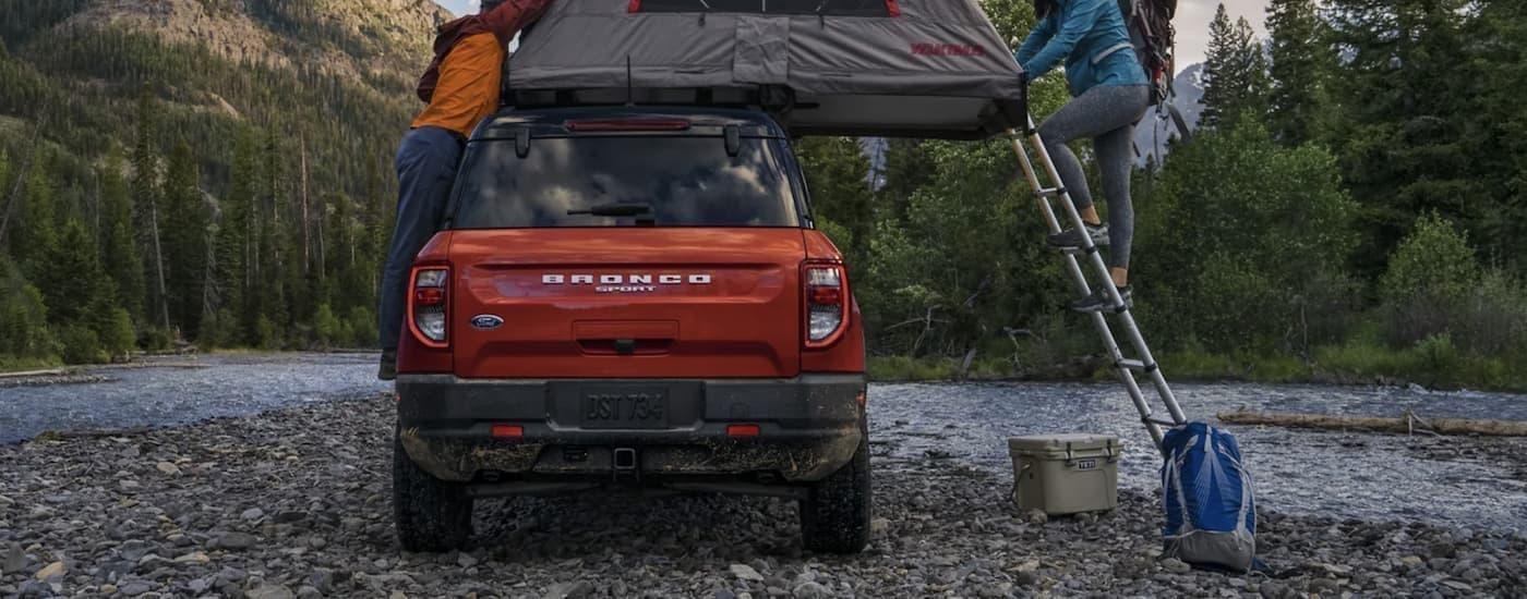 An orange 2025 Ford Bronco Sport from the rear.
