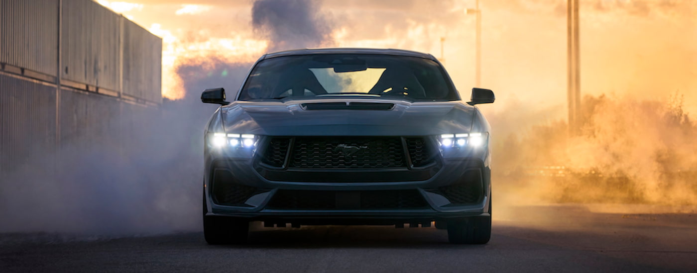 A grey 2024 Ford Mustang from the front.