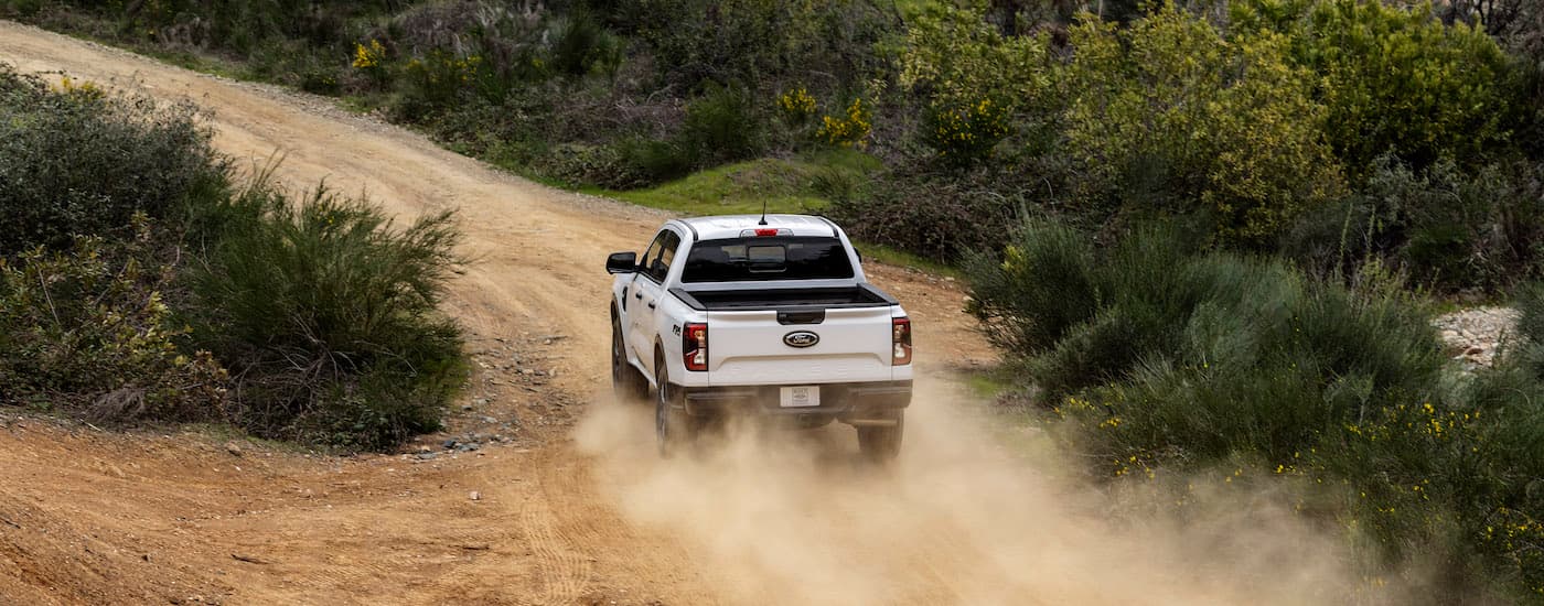 A white 2025 Ford Ranger from the rear.