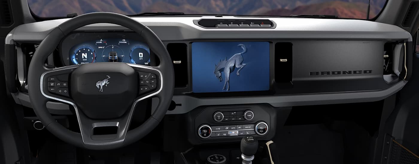 Infotainment display and digital gauge clusters inside a 2026 Ford Bronco