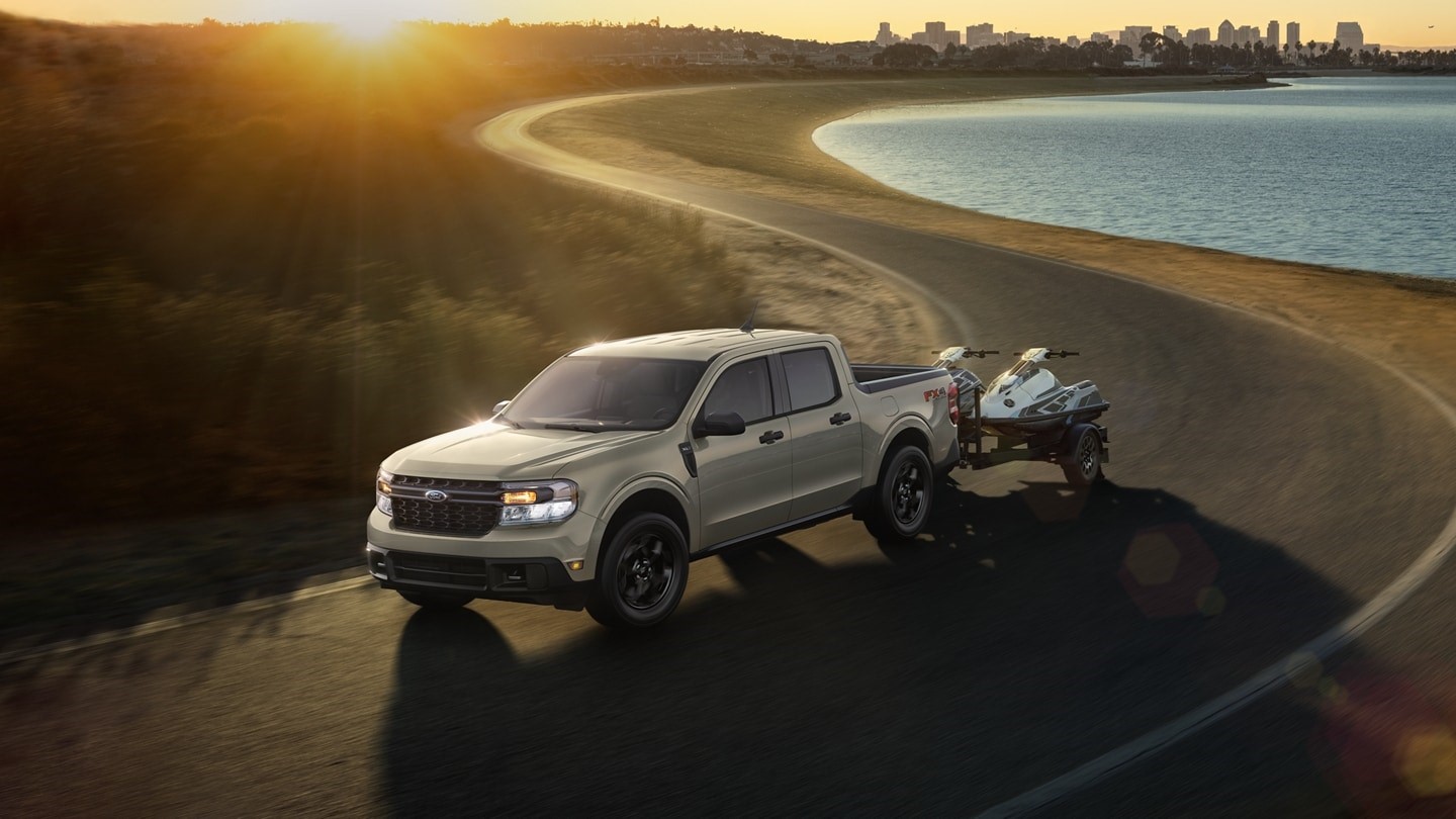 2024 Ford Maverick driving at sunset