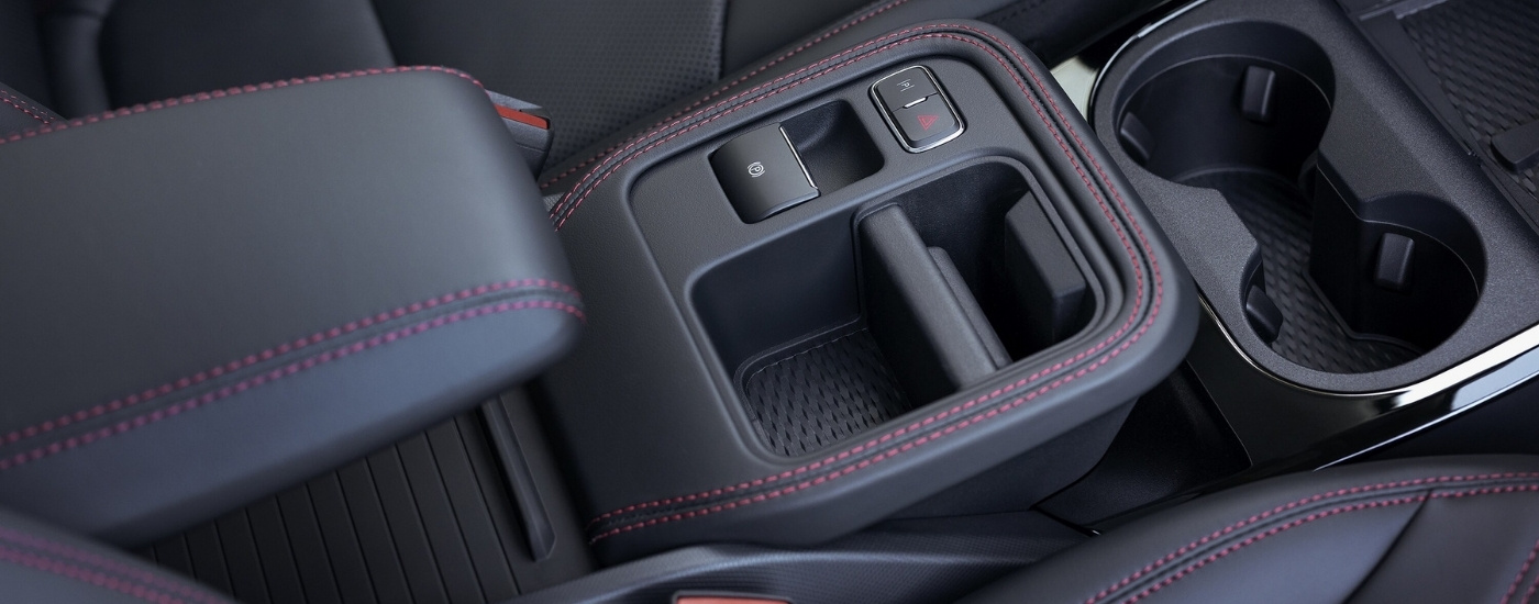 Black leather interior and console in a 2025 Mustang Mach-E Premium Sport Appearance Console.