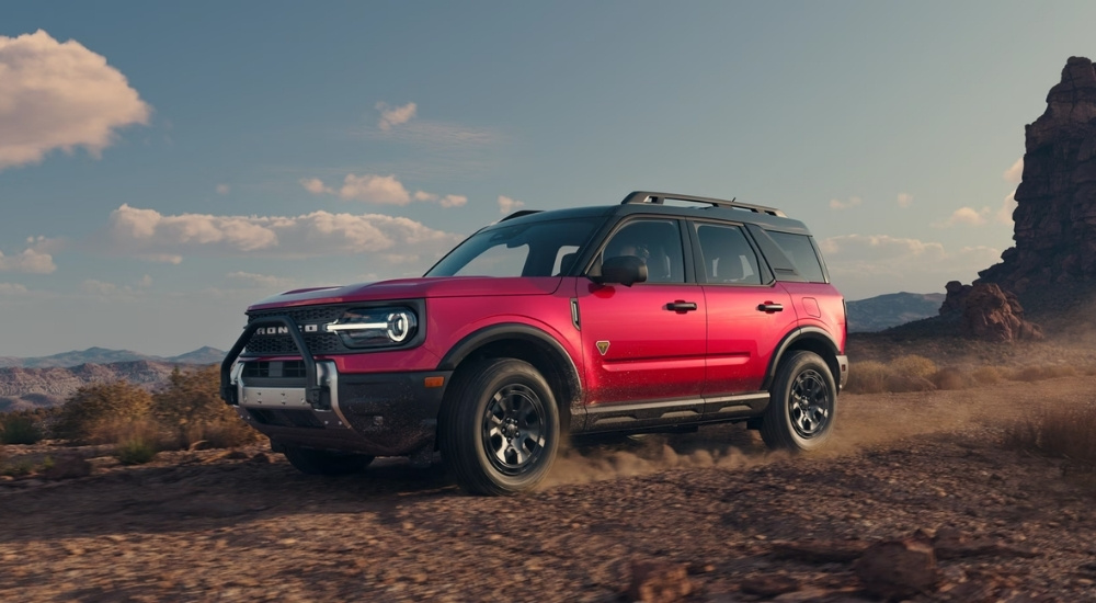 A red 2025 Ford Bronco Sport for Sale in Sacramento driving off-road.