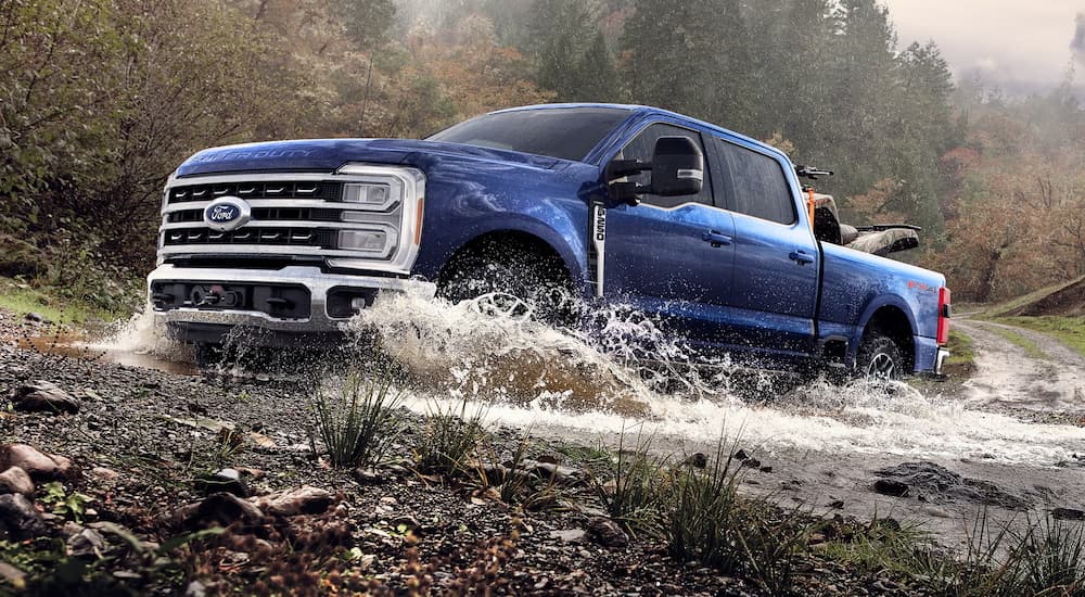 2026 Ford F-250 Tremor off-roading through a river