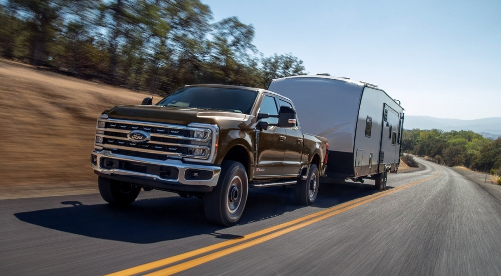 Brown 2026 Ford F-250 Tremor driving to look at Ford trucks for sale in Sacramento