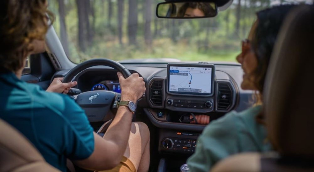 Couple driving in a 20235 Ford Bronco Sport
