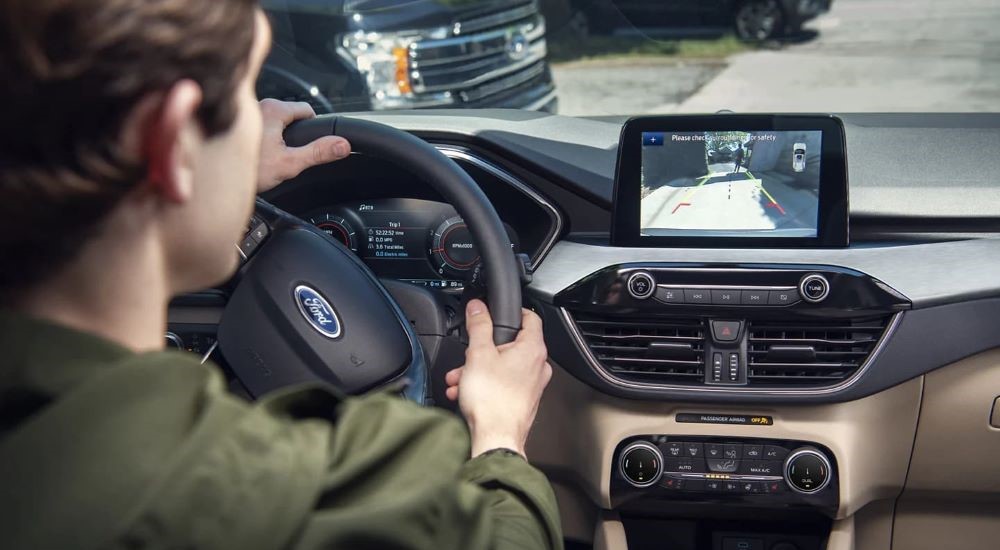 Man driving in a 2020 Ford Escape