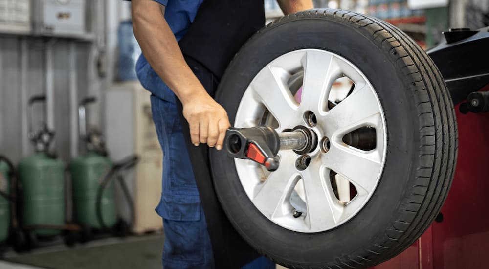 Mechanic working on tire rotations.