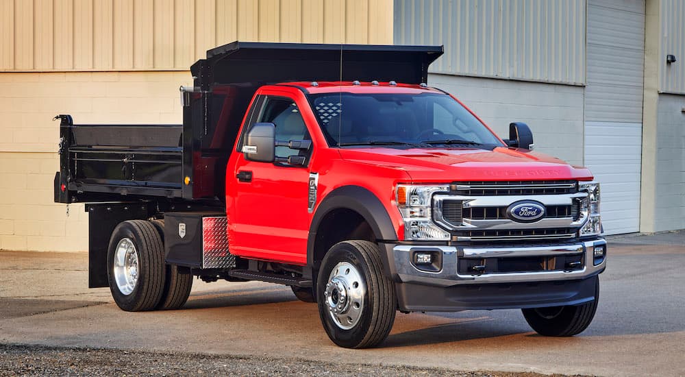 A red 2021 ford F-600 from the front.