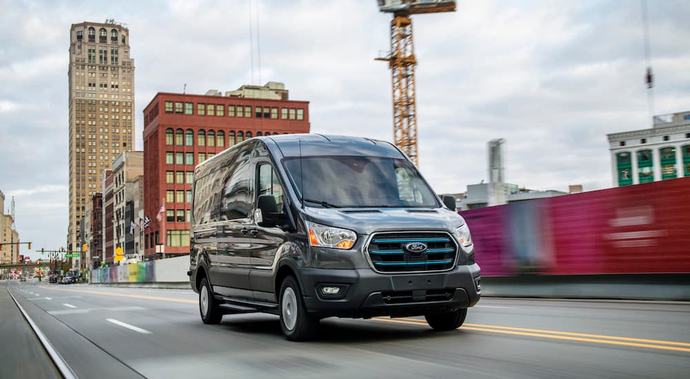A grey 2021 Ford Transit from the front.
