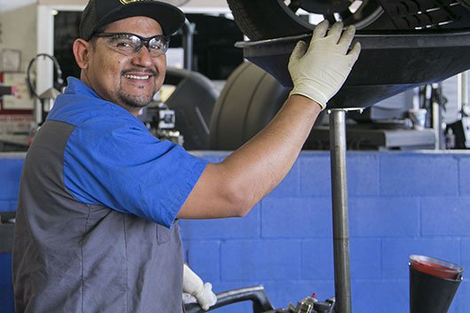 Mechanic Drains Oil