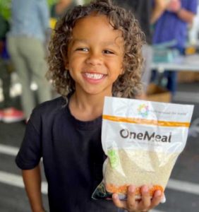 Smiling With Packed Meal