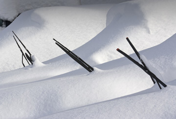 snow covering cars