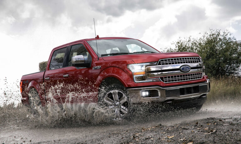2019 Ford F-150 splashing through mud